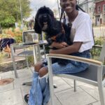Freelance designer specializing in knitwear loves her dog – and Italy