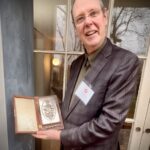 Wyck House descendant with traditional family New Year Cake mold