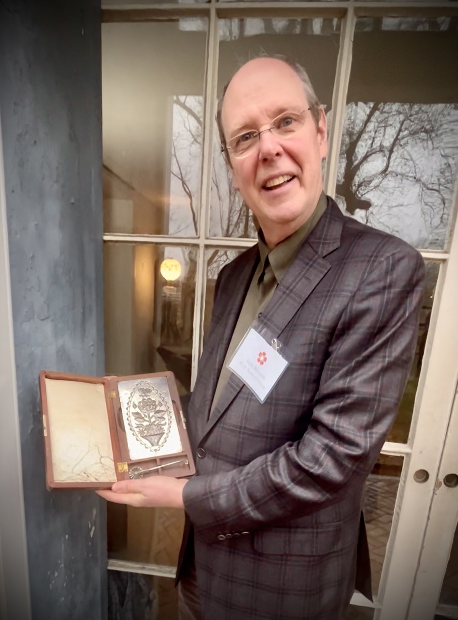 Wyck House descendant with traditional family New Year Cake mold