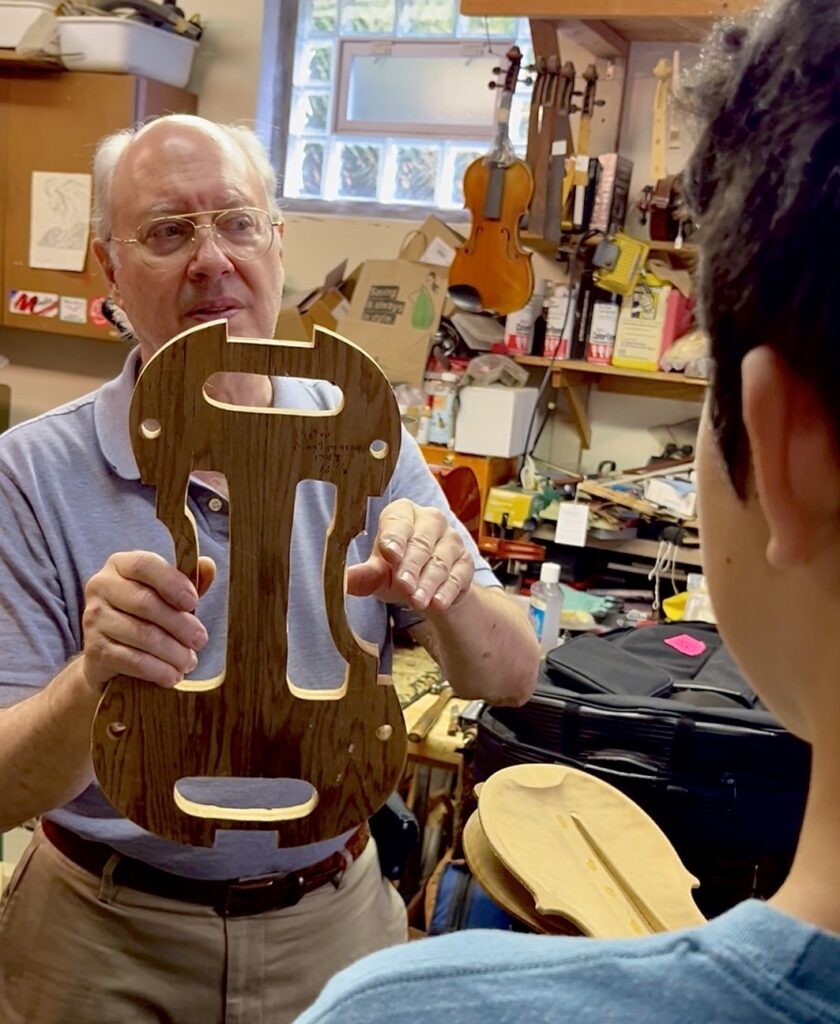 Master violin repairer and designer Harold Golden shows off exquisite work